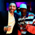 A Man And A Woman Posing For The Camera.